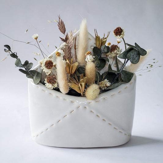 Dried Flowers in Ceramic Envelope Vase